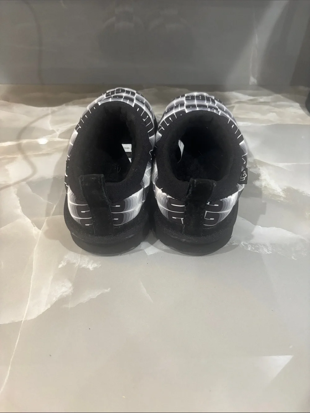UGG Kids Black & White Logo Slip-On Puffer Shoes